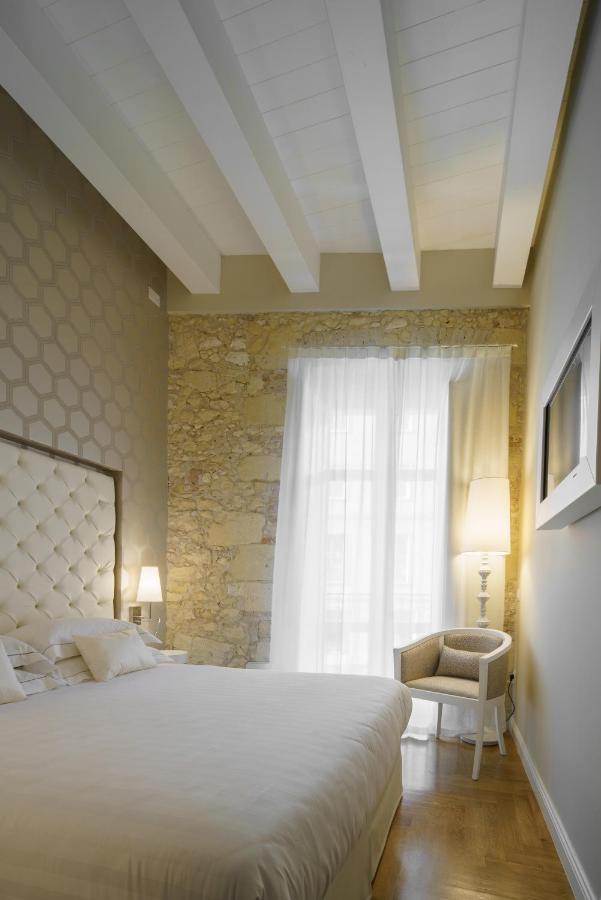Boutique Hotel Carlo Felice กาญารี ภายนอก รูปภาพ